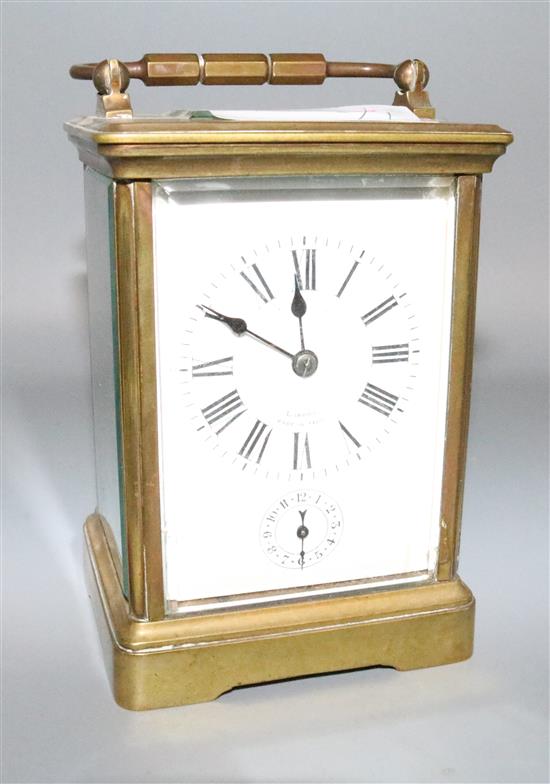 A large French brass carriage clock with alarm